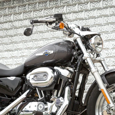 Aura black bar end mirrors on a Harley Sportster 1200
